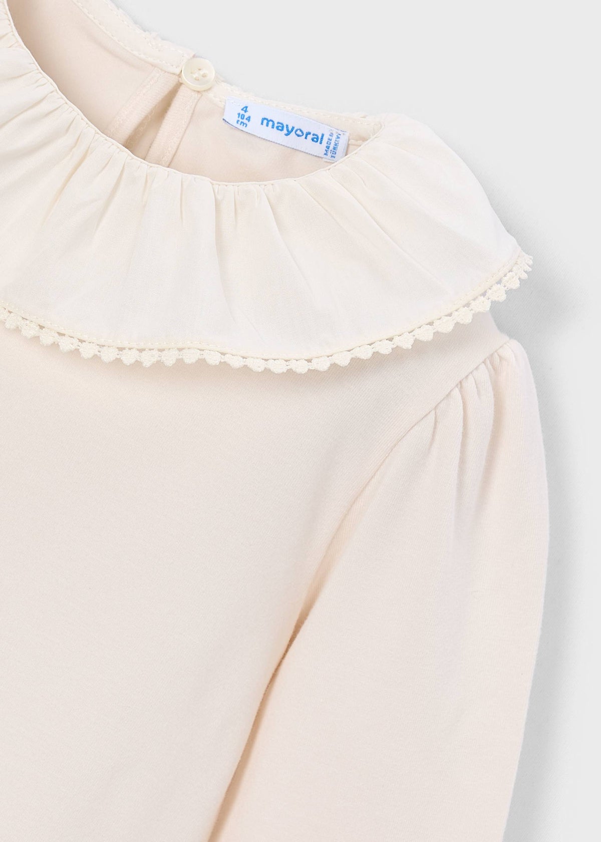 Girl ruffled neck blouse